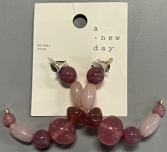 Beaded hoop earrings in pastel pink