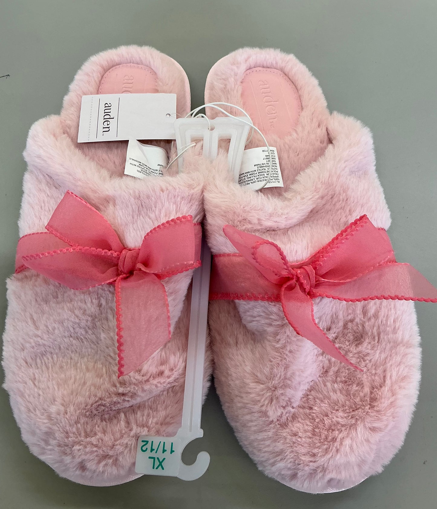 Auden women's faux fur slippers featuring a prominent sheer bow detail
