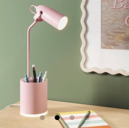 Pink task table lamp with an integrated LED bulb, a pen holder base, and USB charging ports-As Is