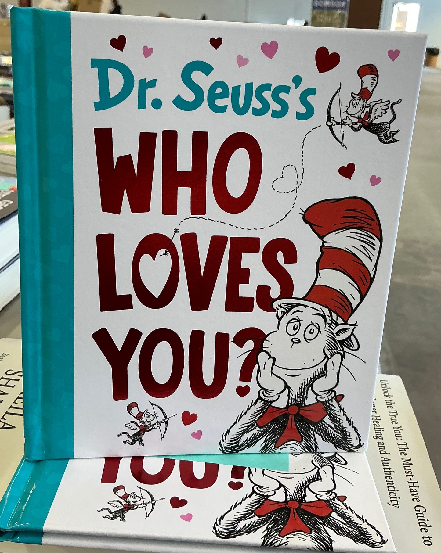Dr. Seuss's Who Loves You?" that features the Cat in the Hat and various other beloved characters