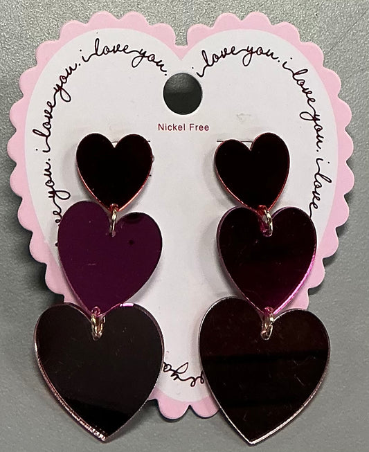 Mirrored heart drop earrings in a red and pink color scheme