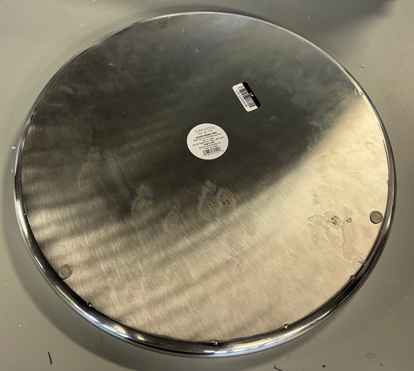 Silver round tray - 16” (L) x 1” (H) x 16” (W) - MINOR COSMETIC FLAWS - PICK UP ONLY