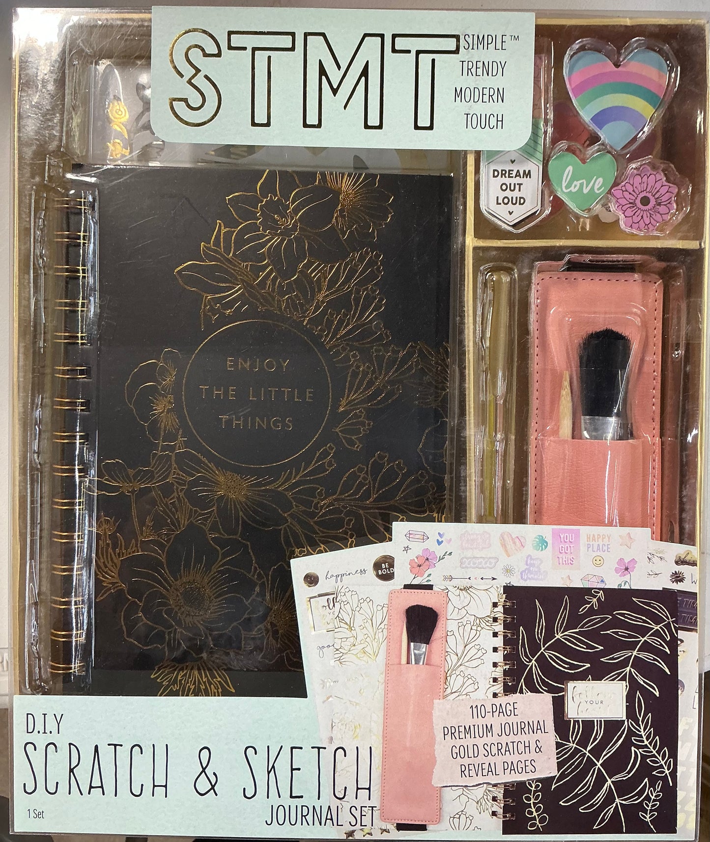 STMT DIY Scratch & Sketch Journal Set featuring a black journal with gold floral accents.