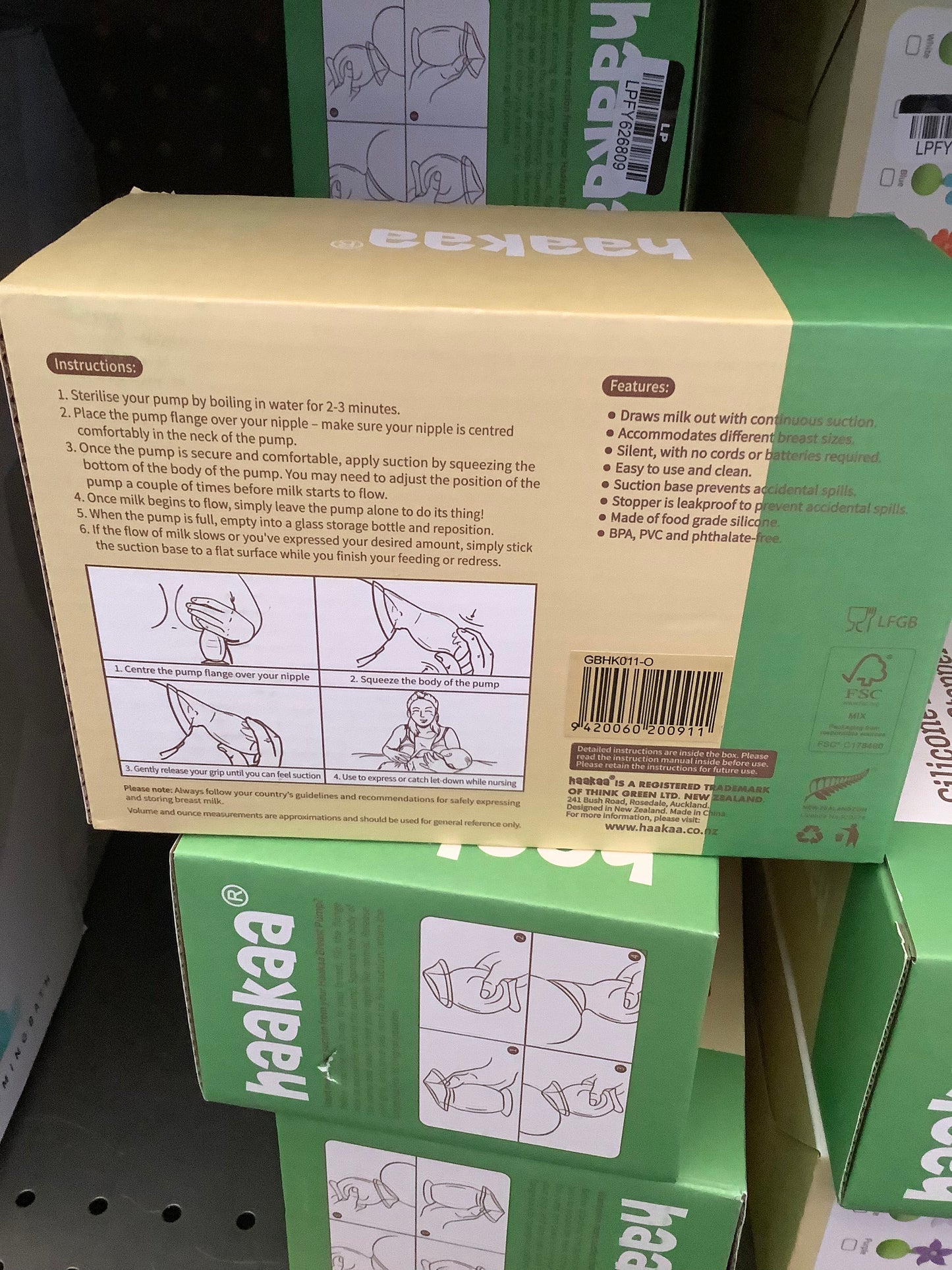 haakaa Breast Pump with Suction Base and Orange Flower Stopper - 5oz