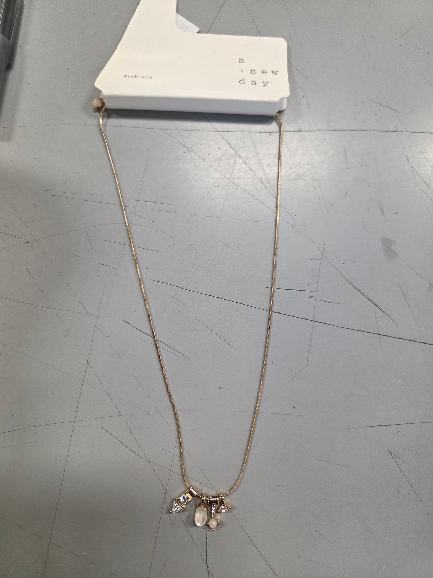 Snake chain charm necklace