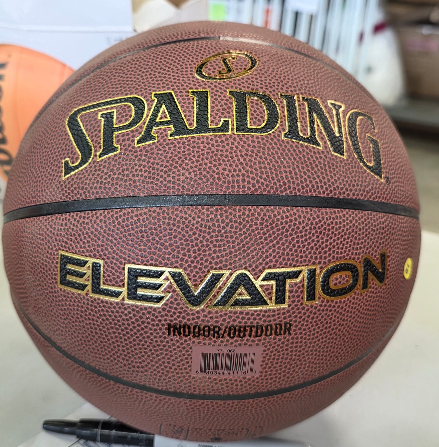 Spalding Elevation 29.5'' Basketball: Official Size Sports Ball, Composite Shell